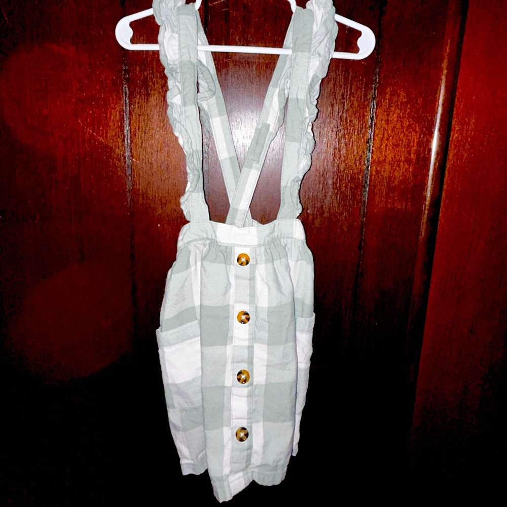 Adorable Skirt with attached straps/suspenders.